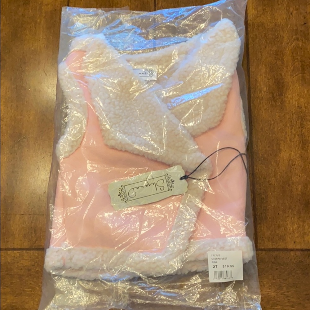 Pink lined vest